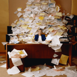 woman-buried-by-paperwork